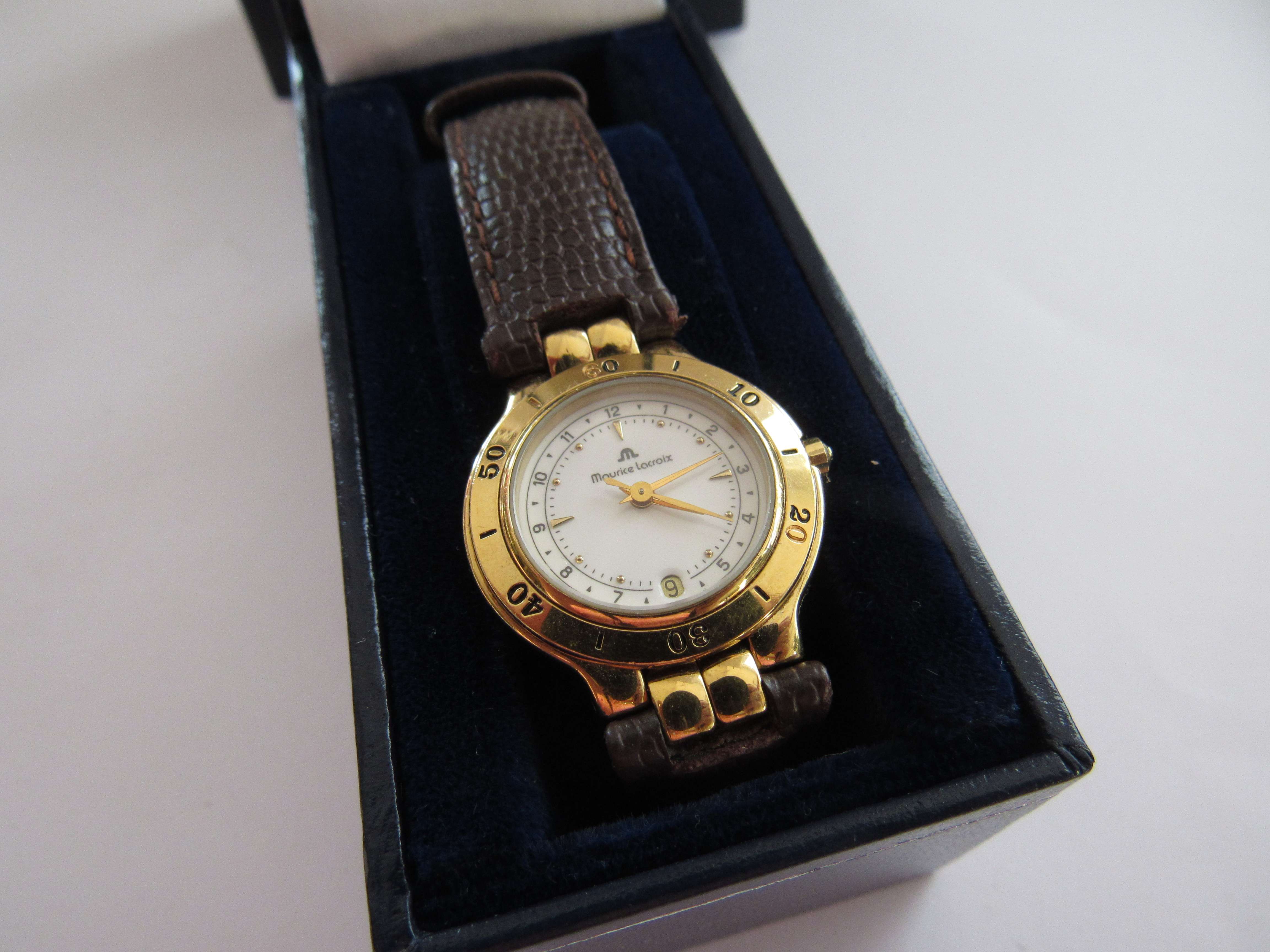 A Maurice Lecroix lady's wristwatch retailed by Mappin and Webb in box and sleeve