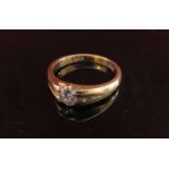 A gold ring set with a single diamond .35ct approx, stamped 18ct.