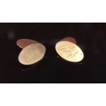 A pair of 9ct gold cufflinks, monogrammed, 5.