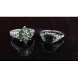 A 9ct white gold emerald and diamond cluster. Size M, 4.