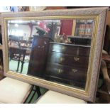 A gilt bevelled edge mirror,