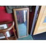 A gilt framed wall mirror,