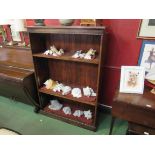 An oak floor standing bookcase with adjustable shelves, beading a/f,