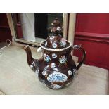 A Victorian Bargeware teapot with inscribed plaque,