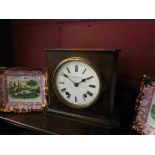A late 19th Century walnut cased mantel clock with Roman enamelled dial signed Camerer Kuss & Co,