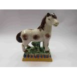 A Staffordshire style Prattware horse,