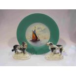 A 19th Century hand painted Minton cabinet plate with a pair of Staffordshire dog figures