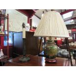 An Asian foliate design table lamp on wooden base and a brass candlestick form table lamp