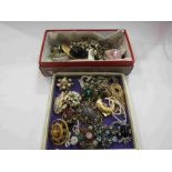 A quantity of bijouterie including costume brooches,