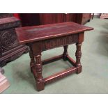 A 17th Century carved oak joint stool,