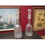 A pair of heavy cut glass Victorian decanters with stoppers,