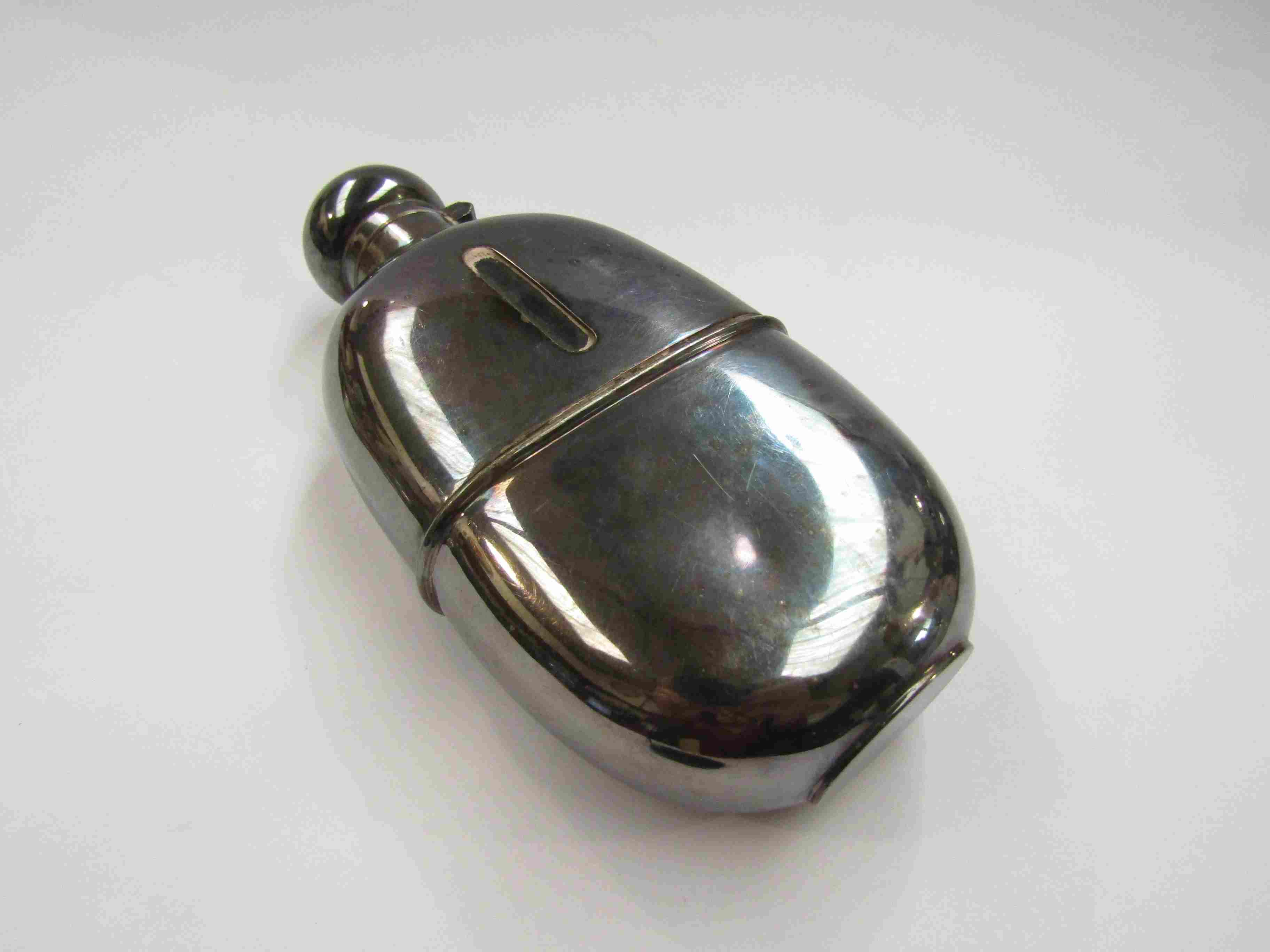 A silverplate hipflask