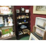 A mahogany waterfall bookcase, two drawer base on squat form cabriole legs,