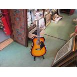 A Stretton Payne Sunburst design acoustic guitar, with soft case,