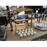 A Franklin Mint spice rack and sixteen porcelain containers