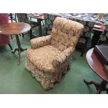 A Victorian Howard and Sons armchair,