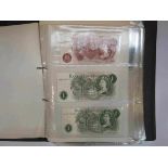 An album of mixed banknotes including USA, Canada, UK, Portugal, Eire, Italy,