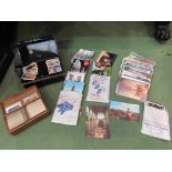 A small quantity of assorted cigarette cards and postcards