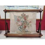 A circa 1840 mahogany tapestry needlepoint work stand with lidded thread box base,