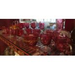 A selection of cranberry glass including decanter,