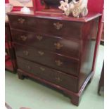 A George III mahogany chest circa 1800 of two short over three graduating long drawers on bracket