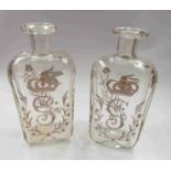 A pair of George III gilt engraved decanters,