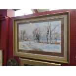 AUBREY R PHILLIPS (XX) A framed and glazed watercolour winter cottage scene.