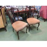 A pair of Edwardian bedroom chairs with carved splats