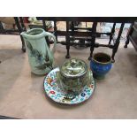 Four pieces of studio pottery including jug and lidded pot