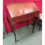A 19th Century French rosewood and satin inlaid bureau with marquetry inlay,