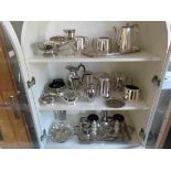 A quantity of silver plated items including rose bowls, gravy boat and bud vase etc.