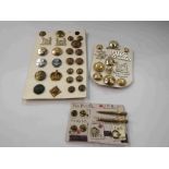 A small quantity of Military buttons and clips