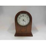 An Edwardian mahogany timepiece with French drum movement and cylinder escapement, with key,