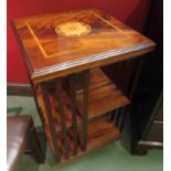 An Edwardian flamed mahogany revolving bookcase,