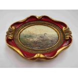 An oval painted miniature of geese monogrammed lower right,