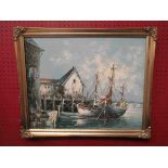 A gilt framed oil on canvas, boats at harbour.
