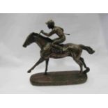 A modern race horse figure with jockey,