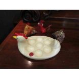 A Happy Hens ceramic egg holder,