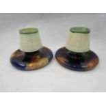 A pair of Wedgwood Majolica match strikers,