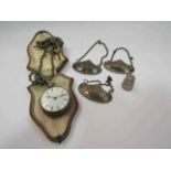 A silver pocket watch, two silver spirit labels and a thimble etc.