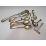A quantity of silver cutlery including sauce ladle and dinner fork