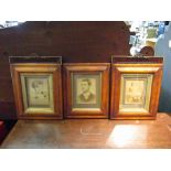 A pair of picture frames and a set of three maple framed and glazed photographs