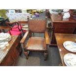 A set of 8 (6+2 carvers) oak dining chairs with studded leather seat and backs