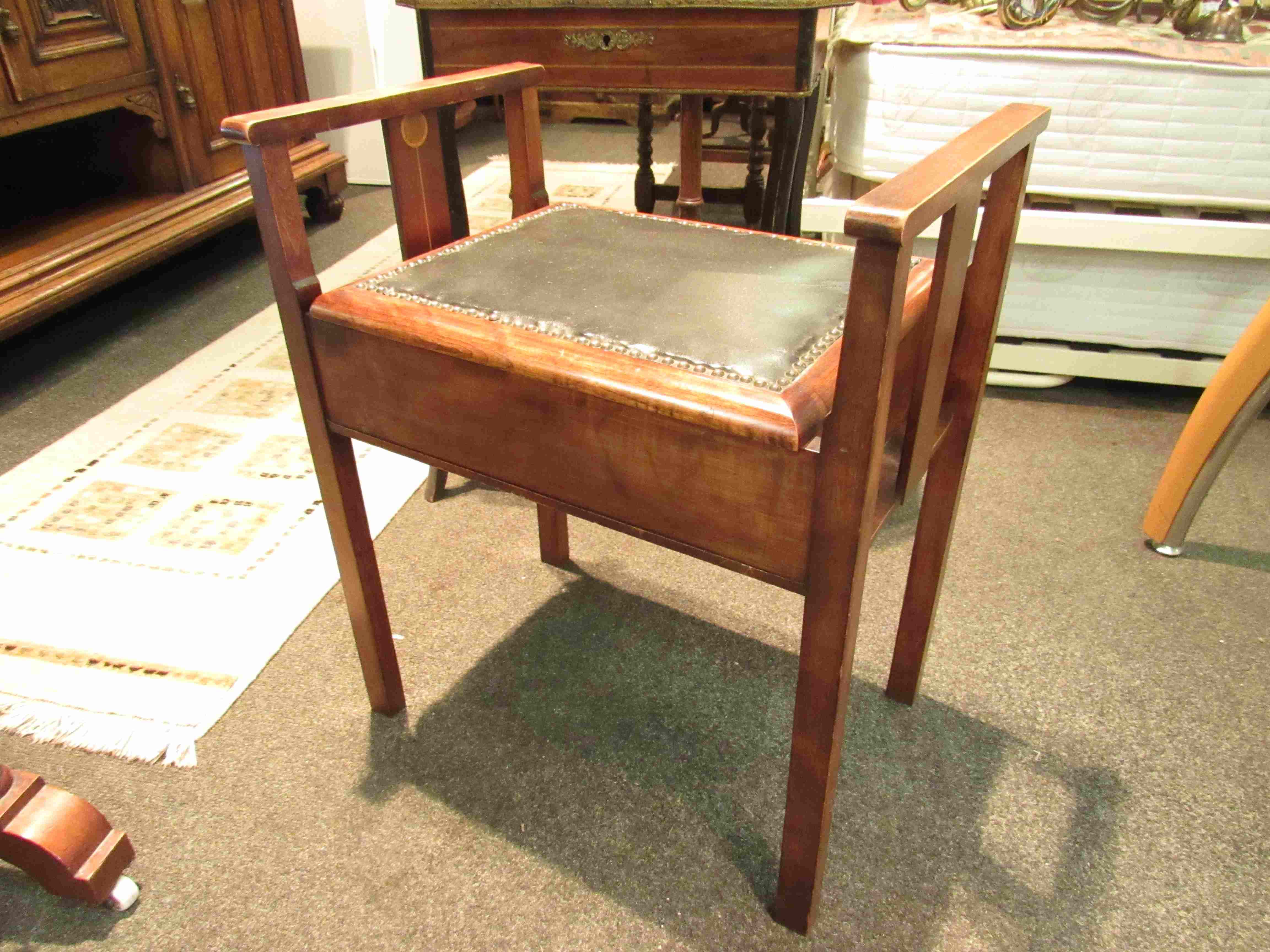 An Edwardian piano stool