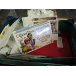 A box containing a quantity of assorted first day covers and stamps,