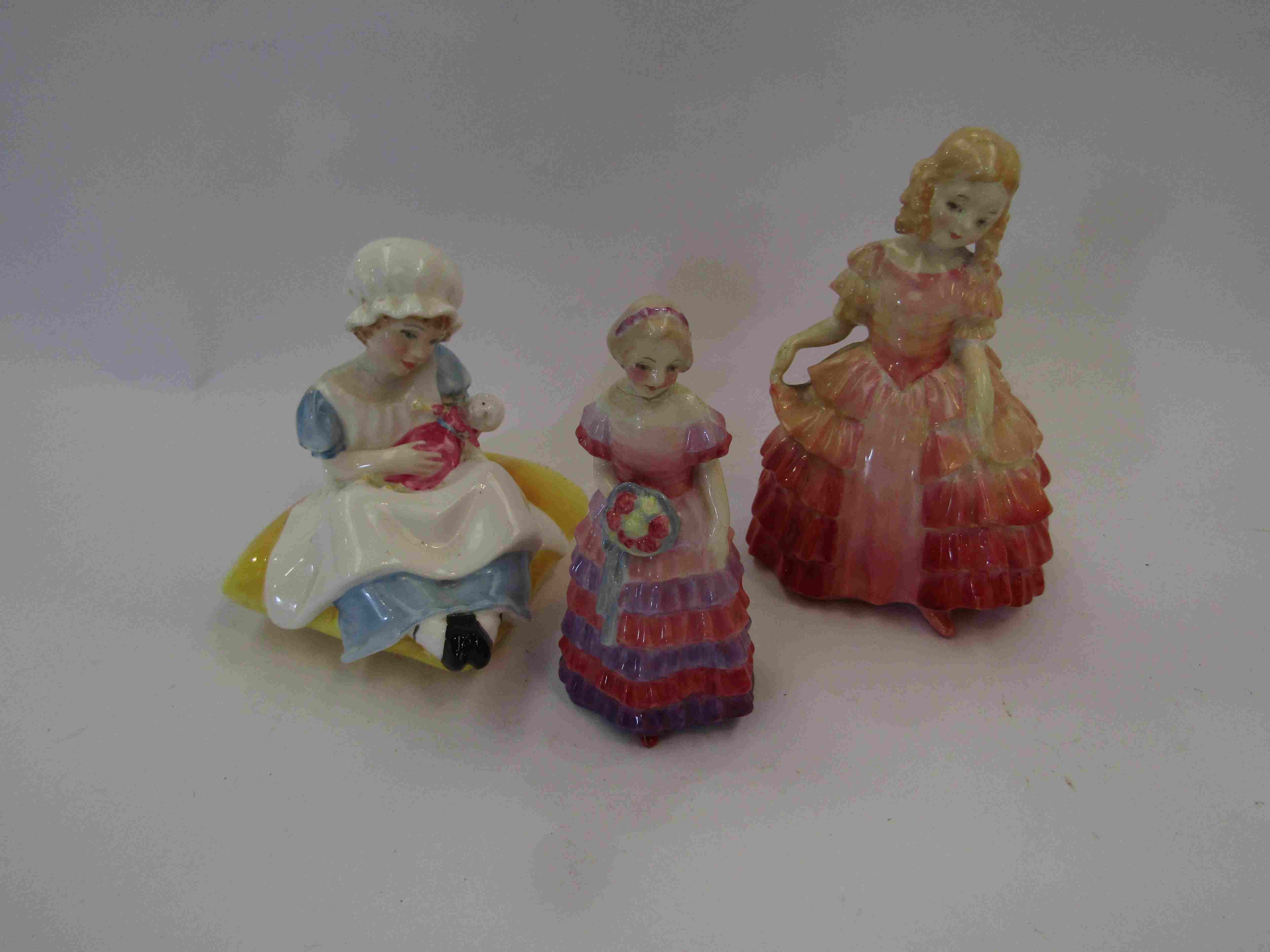 Three Royal Doulton figurines, "Ellen", "Bridesmaid" and "Rose",