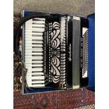 A Galotta 120 bass accordion, 4 voice, 41 keys, black, hard cased.