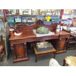 A Victorian mahogany breakfront sideboard with acanthus scroll back,