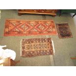 Three small geometric rugs