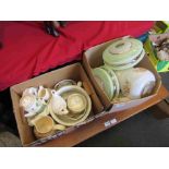 A box of light shades and dinnerware